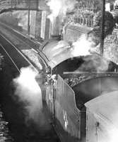 All eyes on the road ahead as V2 2-6-2 60955 heads north away from Galashiels with a freight in the 1960s. The locomotive was eventually withdrawn from St Margarets shed in September 1966 [see image 32070].<br><br>[Dougie Squance (Courtesy Bruce McCartney) //]