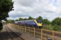 GWR <I>Adelante</I> 180106 eastbound for Paddington alongside the Didcot Railway Centre <I>main line</I>. GWR King 6023 was in steam on this day and I was hoping to photograph this and a modern train together but alas it was not to be.<br>
<br><br>[Peter Todd 27/07/2016]