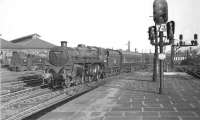 BR Standard class 5 73122 enters St Enoch on 24 May 1957 with a train from Stranraer.<br><br>[G H Robin collection by courtesy of the Mitchell Library, Glasgow 24/05/1957]