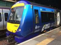 170407 at Edinburgh Waverley on 24 September 2016, in its new livery advertising the British Transport Police text service.<br><br>[Colin McDonald 24/09/2016]