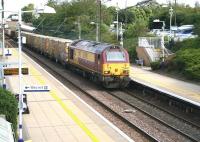 The 1326 ex-Oxwellmains empty 'Binliner' passing through Wallyford on 7 September 2016. The containers are on their way back to Powderhall refuse depot behind 67009.  <br><br>[John Furnevel 07/09/2016]
