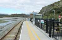 <I>Then and Now</I> at Llandecwyn showing the rebuilt halt looking towards the new Pont Briwet bridge that replaced the old timber structure in 2014. [See image 17931] for the same viewpoint eight years previously, since when the rustic character of this tiny halt has been lost but the facilities have been greatly improved. <br><br>[Mark Bartlett 19/09/2016]