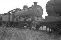 Hill ex-GER J20 0-6-0 64676 seen on 9 October 1961 standing in a lineup of condemned steam locomotives at Stratford. Withdrawn from 31A Cambridge a month earlier it was cut up here at the end of October.<br><br>[K A Gray 09/10/1961]