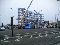 The skeleton of the building which will contain the new entrance and booking hall to Dundee station is now in place. Let's hope this will prove not to date quite so quickly as the last incarnation.<br><br>[David Panton 28/09/2016]