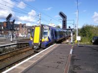 A six-car 380 from Glasgow glides into Platform 4 at Ayr on 1 October.<br><br>[David Panton 01/10/2016]