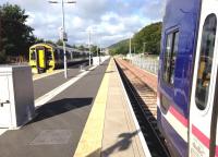 A train from Edinburgh arriving at Tweedbank platform 1 on 29 September 2016 alongside a unit stabled in platform 2.<br><br>[Bruce McCartney 29/09/2016]