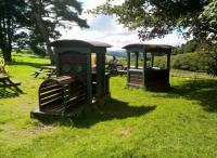 While we are waiting for the L&B to return to this station [see image 56469], there are facilities for all ages of enthusiasts. Children can play in the play trains, while adults can enjoy food, drink, and views.<br><br>[Ken Strachan 28/08/2016]