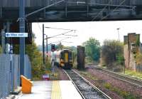 ScotRail 158739 approaching the platform at Brunstane from the south on 17 October 2005 with a mid-morning service to Dunblane ex-Newcraighall. The train is passing the site of Niddrie North Junction.<br><br>[John Furnevel 17/10/2005]