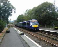 An Edinburgh service pulls into Dunkeld on 05/10/2016. Gas lighting survived here until less than 40 years ago, but nothing has changed since, and probably for a lot longer. Dunkeld manages without departure information, a rarity nowadays but then it's all available by phone app. Who'd have thought of that in gas lighting days?<br><br>[David Panton 05/10/2016]