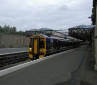 An Edinburgh service pulls out of the usual Platform 5 at Perth on 05/10/2016. This ironwork at this side of the station has not seen a paintbrush for decades. Just saying.<br><br>[David Panton 05/10/2016]