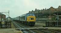 45119 southbound XP through the Midland station. Notice the old track layout and the Brush factory.<br><br>[Peter Todd 28/04/1979]