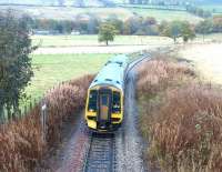 A Kyle of Lochalsh - Inverness train approaching Beauly from the north in November 2003.<br><br>[John Furnevel 22/11/2003]