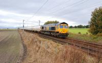 Autumn colour as 66740 passes south with the smelter empties.<br><br>[Ewan Crawford 07/10/2016]