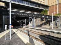 A view of the station throat at Queen Street while the new metalwork is still shiny. The numbers by the signals correspond with the platform numbers. The new platform lighting seems to have been designed to withstand a major earthquake, so full marks there. 08/10/2016<br><br>[David Panton 08/10/2016]