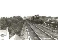 A summer Saturday Blackpool - Glasgow Central express crossing Templand Viaduct, Cumnock, on 29 July 1961 behind Jubilee 45584 <I>North West Frontier</I>. <br><br>[G H Robin collection by courtesy of the Mitchell Library, Glasgow 29/07/1961]