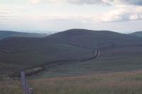 Twixt the Whitrope Tunnel and Shankend. The distant Eildons give away the location of this shot.<br><br>[Bruce McCartney Collection //]