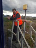 The signalman at Forres with the beginnings of the new station's works beyond.<br><br>[Ewan Crawford Collection 29/08/2016]