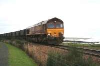 A coal train from Hunterston Import Terminal approaching Longannet power station westbound in January 2007 behind EWS 66072. The train would have run via the Forth Bridge route with a reversal at Halbeath sidings [see image 9821].  <br><br>[John Furnevel 10/01/2007]
