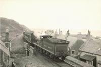 A train approaching Banff on 14 July 1950 behind ex-GNSR 4-4-0 62251.<br><br>[G H Robin collection by courtesy of the Mitchell Library, Glasgow 14/07/1950]