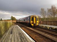 Forsinard's wooden platforms July 2013. The extensions of the platforms at the north end of the station are built in timber and cross over a burn and marshy ground. Much of the surrounding land is low lying and boggy.<br><br>[Ian Dinmore /07/2013]