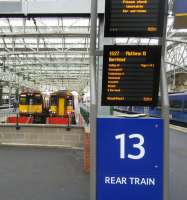 Even if a train is the only one on the platform here at Glasgow Central it is now announced as 'rear train'. This still applies if it is an 11-car Anglo-Scottish service where there simply isn't room for a train in front! There are fixed signs at the buffers too as seen in this view of a Barrhead service at Platform 13 on 15/10/2016.<br><br>[David Panton 15/10/2016]