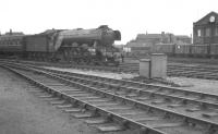 One of Kings Cross shed's A3 Pacifics, no 60110 <I>Robert the Devil</I>, approaching Doncaster with a train from the south in the summer of 1961. <br><br>[K A Gray 29/07/1961]