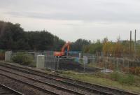 Grab shot from a Blackburn to Bolton train in October 2016 showing the clearing work in connection with the new Northern DMU maintenance depot, on the site of the old Blackburn King St coal depot. The old sidings have been lifted, leaving just a short stub of the main line connection visible on the right of the picture. [See image 56528]<br><br>[Mark Bartlett 21/10/2016]
