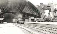 Sunshine at St Enoch on a summer aftenoon in June 1961. On the left Black 5 45124 will shortly depart for Largs, while over on the right sister locomotive 45167 is at the head of a Kilmarnock train.<br><br>[G H Robin collection by courtesy of the Mitchell Library, Glasgow 03/06/1961]