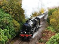 A foggy autumn morning at Glenfinnan on 20 October 2016. K1 62005 has the sanders operating and steam heating on as it hammers up the gradient towards Glenfinnan Station with <i>The Jacobite</I>.<br><br>[John Gray 20/10/2016]