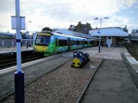 The Borders Railway liveried unit takes the message to the North East with this Edinburgh to Aberdeen service at Arbroath on 19/10/2016. As scheduled it ran non-stop between Haymarket and Dundee to the consternation of two passengers in my hearing. Despite all the information available these days people are still getting on the wrong trains!<br><br>[David Panton 19/10/2016]