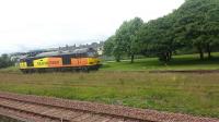 This is Craiginches cement sidings in an industrial area of Aberdeen. Colas Rail 60076 Dunbar, which was named here in March 2016 by the then Scottish Government Minister Derek McKay MSP, waits to return the empty VTG wagons to Tarmac's Oxwellmains cement works. Another connection between these places is that the railway is helping to preserve these place-names which are at some risk of disappearing. Craiginches Prison closed in 2014 with new housing on the site not certain to retain the name. Oxwellmains cement works and landfill have a limited lifespan so who knows what will become of that name in coming decades. [Ref query 17831]<br><br>[Charlie Niven 20/06/2016]