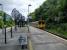 A New Brighton service calls at Birkenhead Park on 30/06/2016. Let the sign tell you the claim to fame. This station was joint Seacombe, Hoylake and Deeside Railway and Mersey Railway.<br><br>[David Panton 30/06/2016]