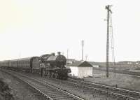 Approaching Lochgreen Junction on 5 August 1955 is one of Hurlford shed's class 2P 4-4-0s no 40687 at the head of a Glasgow St Enoch - Girvan train.  <br><br>[G H Robin collection by courtesy of the Mitchell Library, Glasgow 05/08/1955]