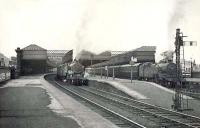 The east end of Paisley Gilmour Street on Saturday 24 September 1949, with Glasgow bound trains at the platforms. Fowler 2-6-4T 42421 is ex-Gourock, while Fairburn 2-6-4T 2195 has arrived with a train from Ayr.<br><br>[G H Robin collection by courtesy of the Mitchell Library, Glasgow 24/09/1949]