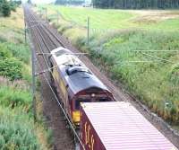 The 0422 Tees Dock – Mossend Euroterminal approaching Carstairs East Junction off the Edinburgh line on 31 August 2016. The train is routed via Darlington South Junction, the ECML, Millerhill and the Edinburgh sub. <br><br>[John Furnevel 31/08/2016]