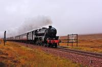 On a dreich, foggy, afternoon, Black 5 No.44871 races over Corrour Summit<br>
with the SRPS Railtour from Fort William to Polmont.47 826 on rear.<br><br>[John Gray 29/10/2016]