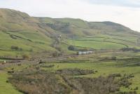 150228 and 142003 toil up the last few yards of the climb from Todmorden to Copy Pit Summit with a service from Bolton (via Manchester) to Blackburn on 31st October 2016. Copy Pit Summit also marks the boundary between Lancashire and West Yorkshire. <br><br>[Mark Bartlett 31/10/2016]