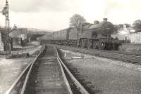 Hurlford 2P 4-4-0 no 40617 calls at Caldwell on 11 July 1956 with a St Enoch - Kilmarnock train. The station, which opened with the line in 1871, was briefly renamed Uplawmoor on closure of the L&A station of the same name in 1962, but eventually closed in November 1966. [Ref query 92]   <br><br>[G H Robin collection by courtesy of the Mitchell Library, Glasgow 11/07/1956]