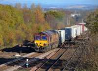 DB Cargo 66102 takes the Cumbernauld line at Greenhill Lower Junction with a Grangemouth - Mossend intermodal trip on 7 November. Not the concrete base prepared off to the left.<br><br>[Bill Roberton 07/11/2016]