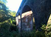 When I first called here in 1988, in a borrowed Jaguar, I found a very hospitable local gent on the deck, and a lovely view down the valley. Now both ends are fenced off; but it's still a marvellous bridge.<br><br>[Ken Strachan 22/10/2016]