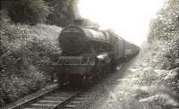 The down mid-day <I>'Paddy'</I> near New Galloway on the Port Road in the summer of 1956. The locomotive is Kingmoor shed's Jubilee 45691 <I>Orion</I>. [Ref query 2486]<br><br>[G H Robin collection by courtesy of the Mitchell Library, Glasgow 14/07/1956]