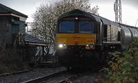 Southbound 66743 passes the signal box at Craigendoran and is about to join the Helensburgh line.<br><br>[Ewan Crawford 18/11/2016]