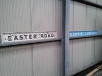 In terms of football rivalry (like I care) these two names should never be seen together but here in the museum all that is put aside. These are name signs from signal boxes (boxboards, in the railwayana world). The Easter Road one can be seen in situ in [see image 35868] where the box dominates the platform! Photographed 03/09/2016.<br><br>[David Panton 03/09/2016]