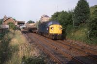 40141 heads a special Down freight on the 13th of July 1978. Freight facilities at Newburgh were withdrawn in October 1979, with the signal box, loop and sidings being abolished during October 1980. But the station building was to remain standing for another 36 years.<br><br>[Graeme Blair 13/07/1978]