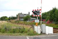 The former station at Forteviot in July 2006, looking west from the level crossing. [Ref query 137]<br><br>[John Furnevel 07/07/2006]