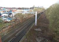 Parting of the ways. Scene heading north from Strathclyde Junction, less than quarter of a mile from Dalmarnock in the spring of 2007. The line on the left is the Glasgow Central Railway route dropping down to reach the station, following which it will pass below Dalmarnock Road and turn west towards the city centre. On the right is the trackbed of the Switchback, which once crossed the road at the same point, but by means of a bridge, before continuing its journey north. [See image 14355]    <br><br>[John Furnevel 01/04/2007]