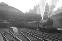 A Fife Coast excursion about to leave Glasgow Queen Street for Crail on 25 June 1950. The locomotive is 'Director' class 4-4-0 no 62684 <I>Wizard of the Moor</I>.  <br><br>[G H Robin collection by courtesy of the Mitchell Library, Glasgow 25/06/1950]