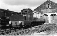 Ex Aberdeen Gas Board 4W DM shunter sits outside Aviemore Shed in April 1977 coupled to a buffet car from the former E&G Swindon Inter City DMU.<br><br>[John McIntyre /04/1977]