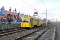 Blackpool <I>Centenary </I> Car No. 642 runs north towards Little Bispham near the new Lowther Avenue stop on 26th October 2011. This was the last year that the 1986 built tram ran in ordinary service. It is now part of the Blackpool Heritage Trust collection and has been operated occasionally, still in this overall yellow livery. <br><br>[Mark Bartlett 26/10/2011]