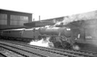 Wigan based Black 5 45449 stands alongside Carlisle's platform 4 on 24 August 1963. The locomotive has recently taken over train 1M21, the 10.35am summer Saturday Glasgow Central - Blackpool.<br><br>[K A Gray 24/08/1963]